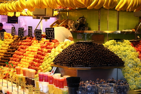 La Boqueria fruit stand in Barcelona; by Wolf Rosenberg
