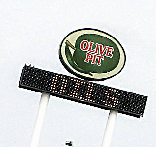 Olive Pit - Popular Stop-in! by Suzi Rosenberg